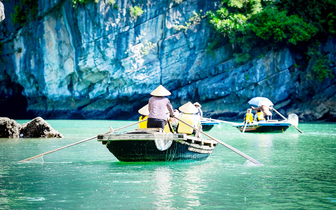 Bamboo Rowing Boat in Halong Bay cruise tour